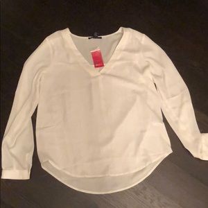 white long sleeve top